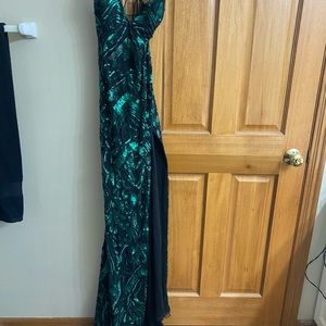Prom dress size 6 high slit string-work on back. Must See! Was $700 asking $200